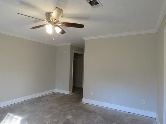 empty room with crown molding, ceiling fan, and concrete floors