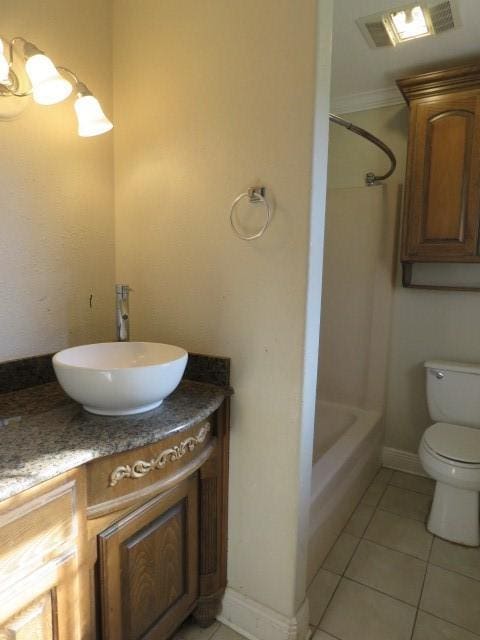 full bathroom featuring tile patterned flooring, vanity, toilet, and bathing tub / shower combination