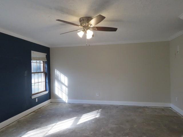 empty room with concrete flooring, ceiling fan, and crown molding