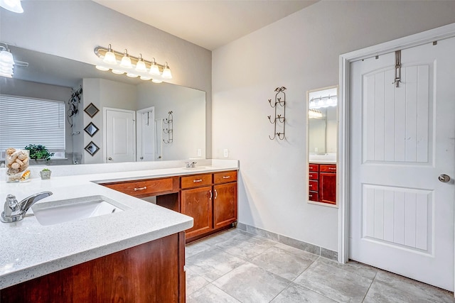 bathroom featuring vanity and tile patterned flooring