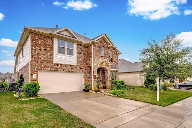 view of front of house with a garage and a front lawn