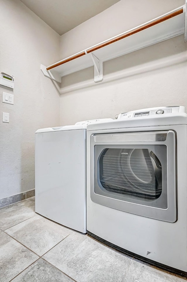 washroom with washer and clothes dryer