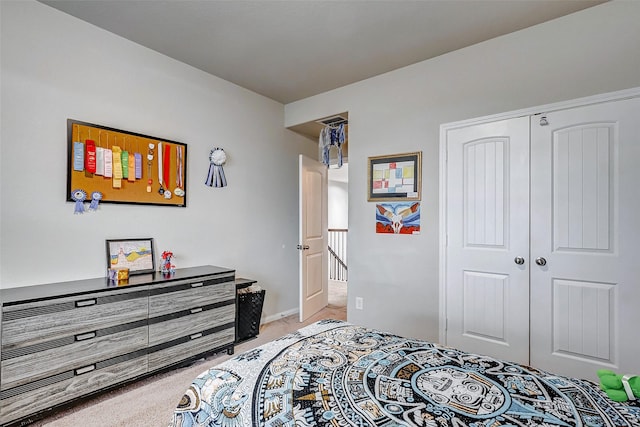 carpeted bedroom featuring a closet