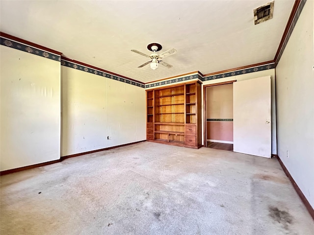 unfurnished bedroom featuring carpet flooring and ceiling fan