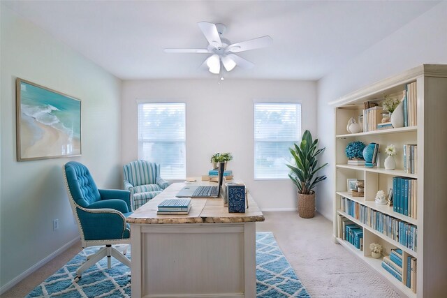 office with ceiling fan and light colored carpet