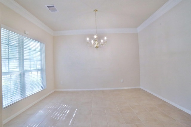 empty room with light tile patterned floors, ornamental molding, and an inviting chandelier