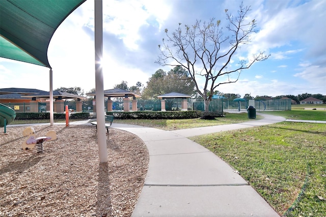 view of community featuring a gazebo and a lawn