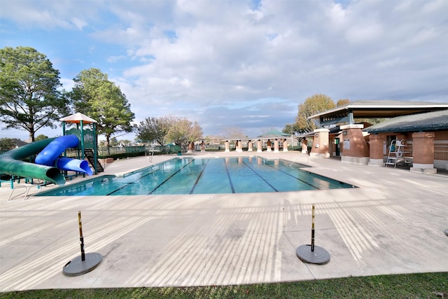 view of pool featuring a patio