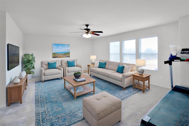 living room featuring ceiling fan and light carpet