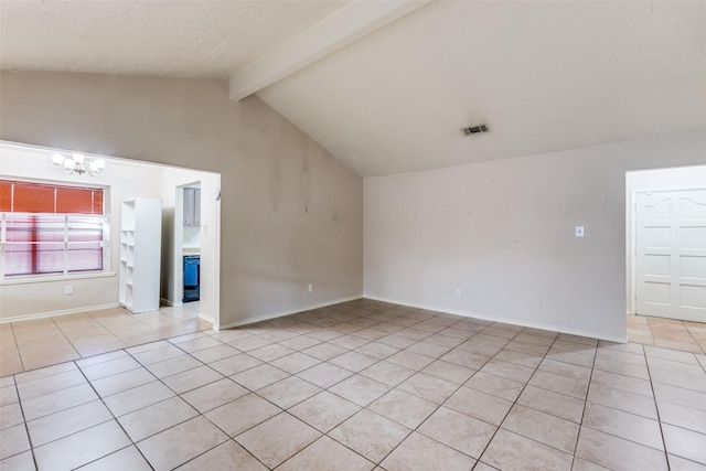 spare room featuring vaulted ceiling with beams, light tile patterned flooring, a chandelier, and a textured ceiling