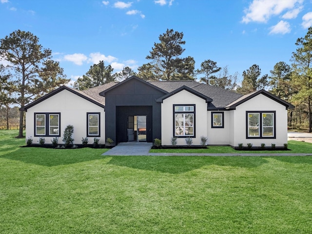 view of front of home with a front lawn