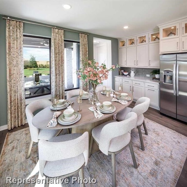 dining room with dark wood-type flooring