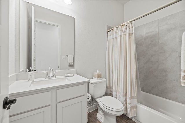 full bathroom with toilet, vanity, shower / bath combination with curtain, and hardwood / wood-style flooring