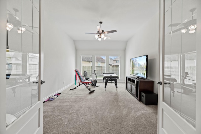 workout room featuring carpet, ceiling fan, lofted ceiling, and french doors