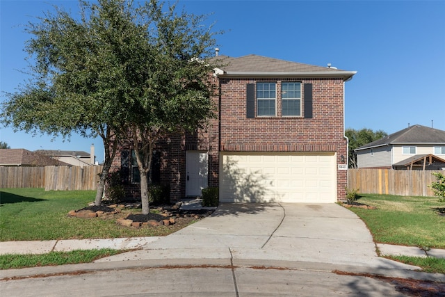 front of property featuring a garage and a front lawn