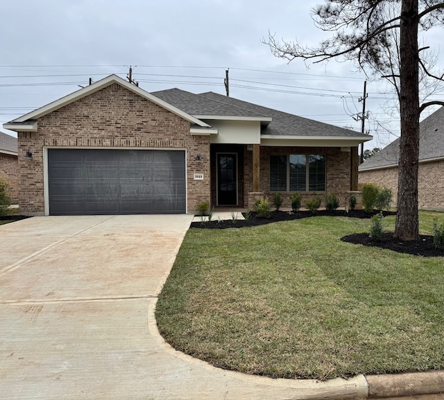 ranch-style home with a garage and a front yard