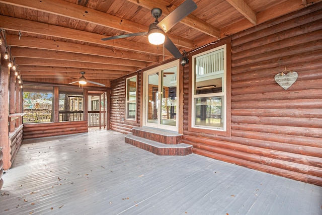 wooden deck featuring ceiling fan and covered porch