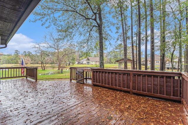 wooden deck with a yard