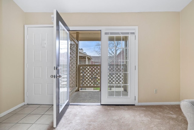 entryway with light carpet