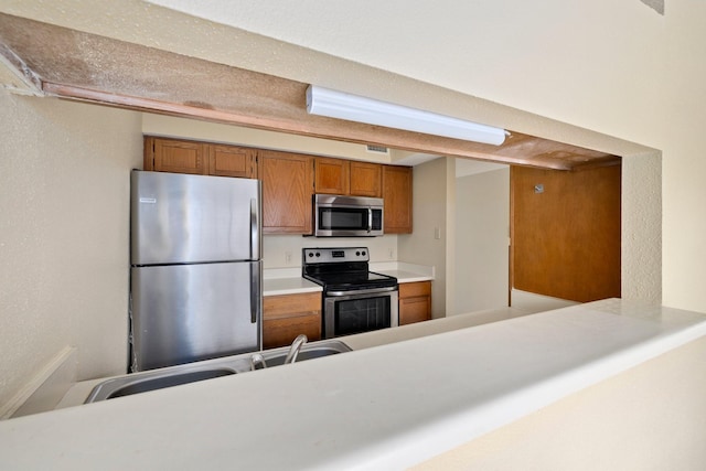 kitchen with stainless steel appliances and sink