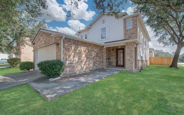 view of front of house featuring a garage and a front lawn