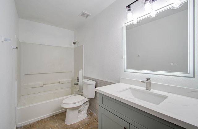 full bathroom with shower / tub combination, vanity, and toilet