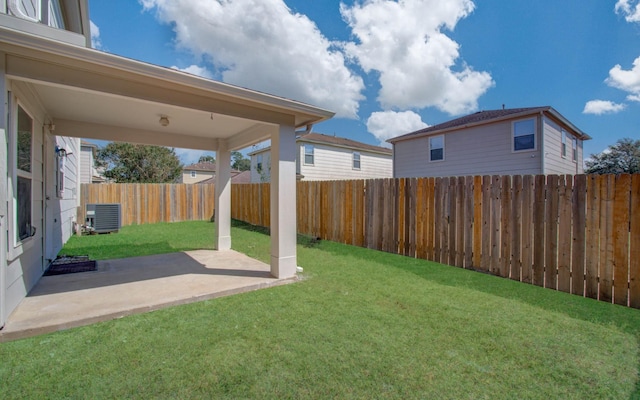 view of yard with a patio area and cooling unit