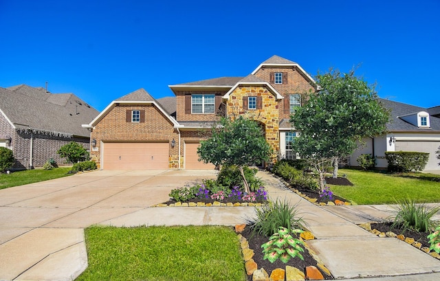 craftsman inspired home featuring a front yard and a garage