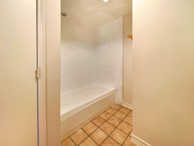 bathroom featuring shower / bathing tub combination and tile patterned floors