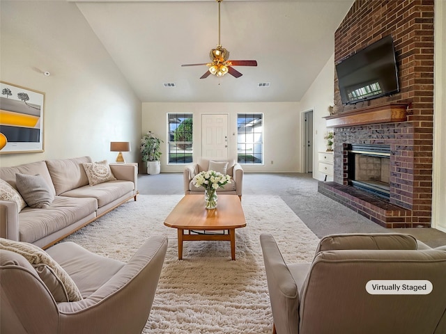 living room featuring light carpet, a fireplace, ceiling fan, and high vaulted ceiling