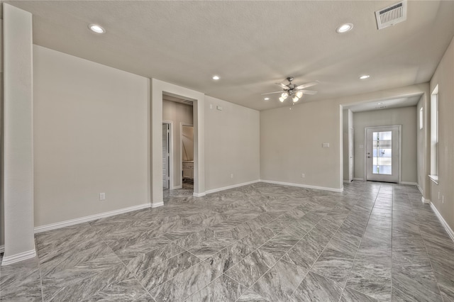 unfurnished room featuring ceiling fan