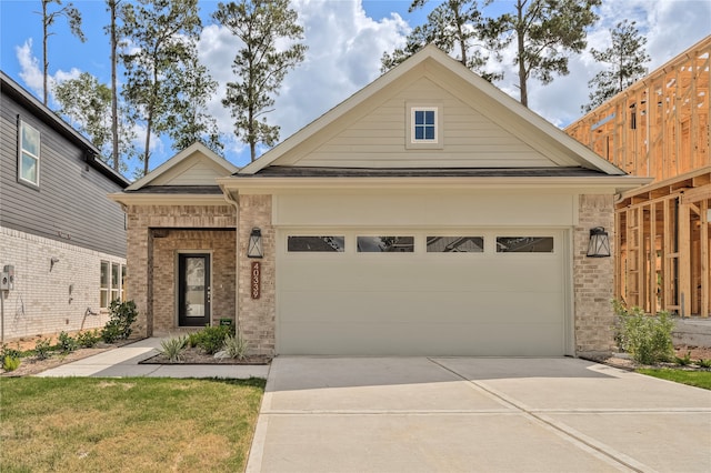 view of front of property featuring a garage