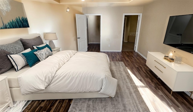 bedroom featuring dark hardwood / wood-style floors