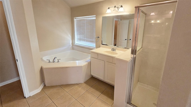 bathroom featuring tile patterned flooring, vanity, and independent shower and bath