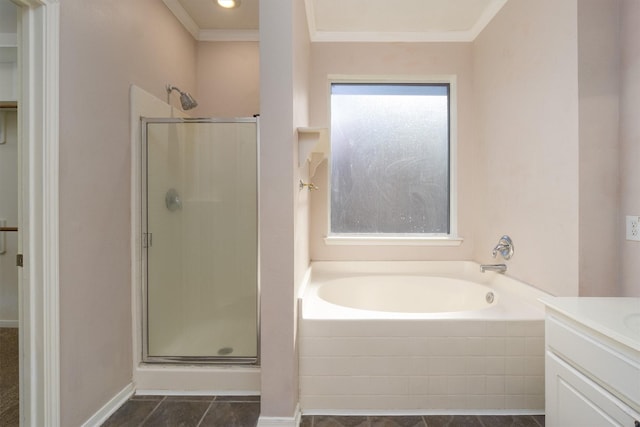 bathroom featuring separate shower and tub, crown molding, and a healthy amount of sunlight