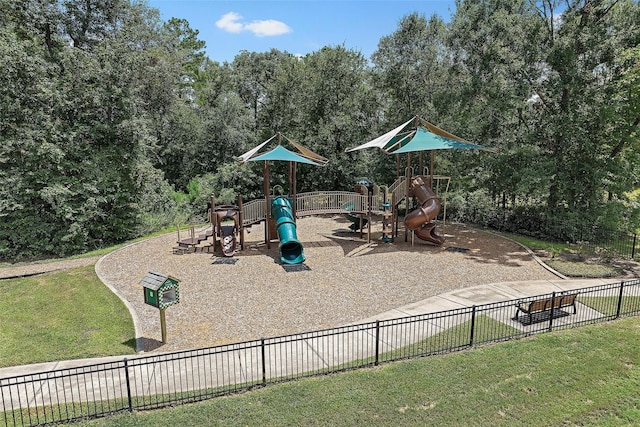 view of playground featuring a lawn