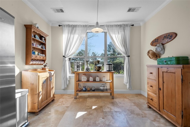 dining room featuring ornamental molding