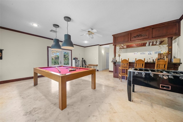 recreation room with french doors, ceiling fan, crown molding, and pool table