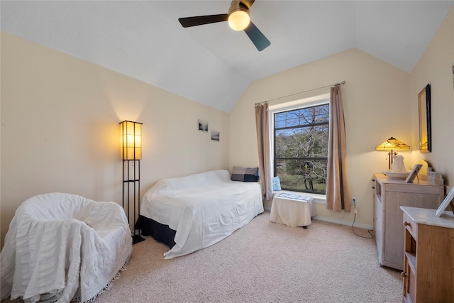 bedroom with light carpet, ceiling fan, and lofted ceiling