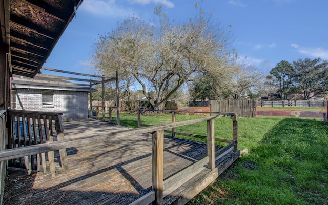 view of yard with a wooden deck