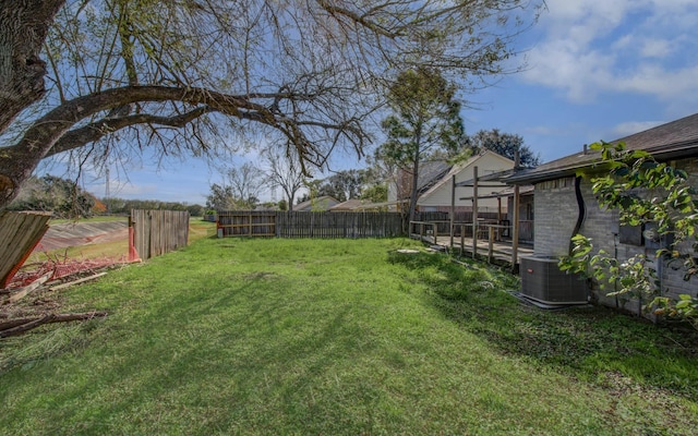 view of yard featuring central AC unit