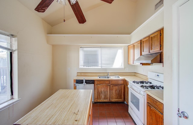 kitchen featuring dishwasher, lofted ceiling with beams, sink, ceiling fan, and white gas stove