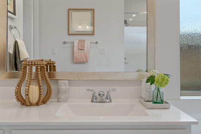 bathroom featuring vanity and walk in shower