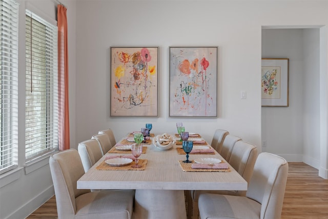 dining room with light wood-type flooring