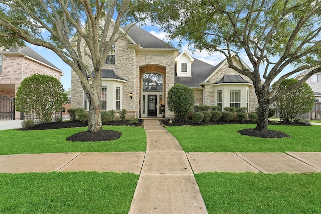 view of front of home with a front yard