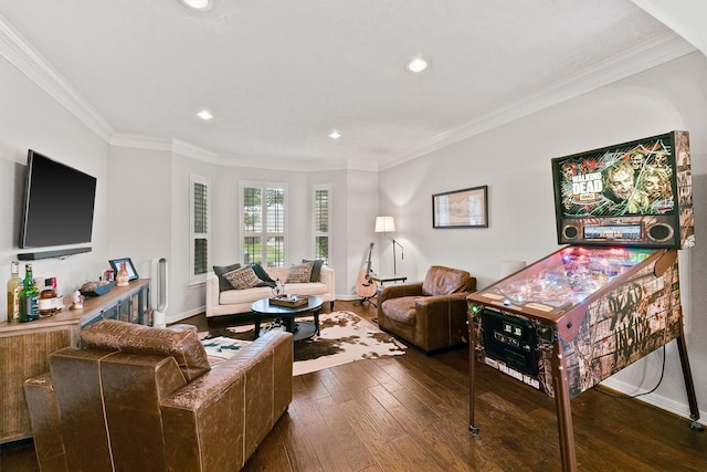 living room featuring dark hardwood / wood-style floors and crown molding