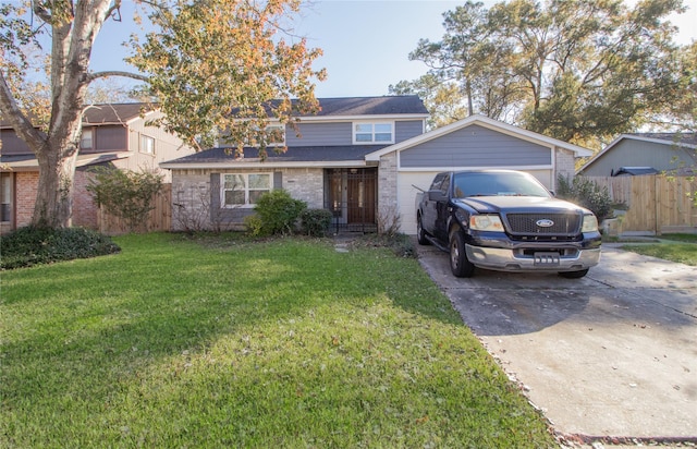 front of property with a garage and a front lawn