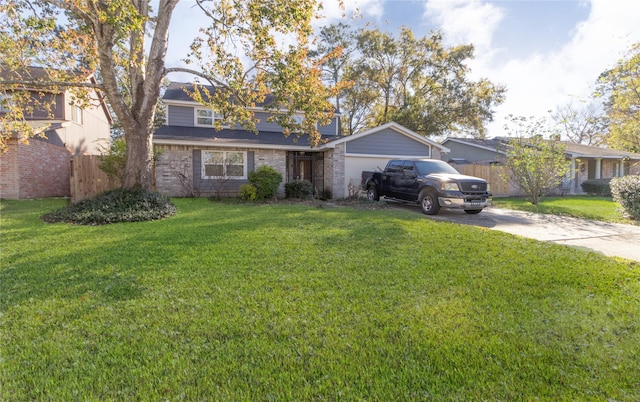 view of front facade featuring a garage and a front lawn