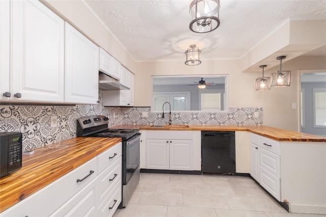 kitchen with pendant lighting, electric range, white cabinets, black dishwasher, and butcher block counters