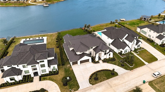 bird's eye view with a water view